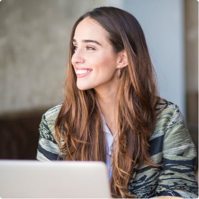 Woman smiling laptop